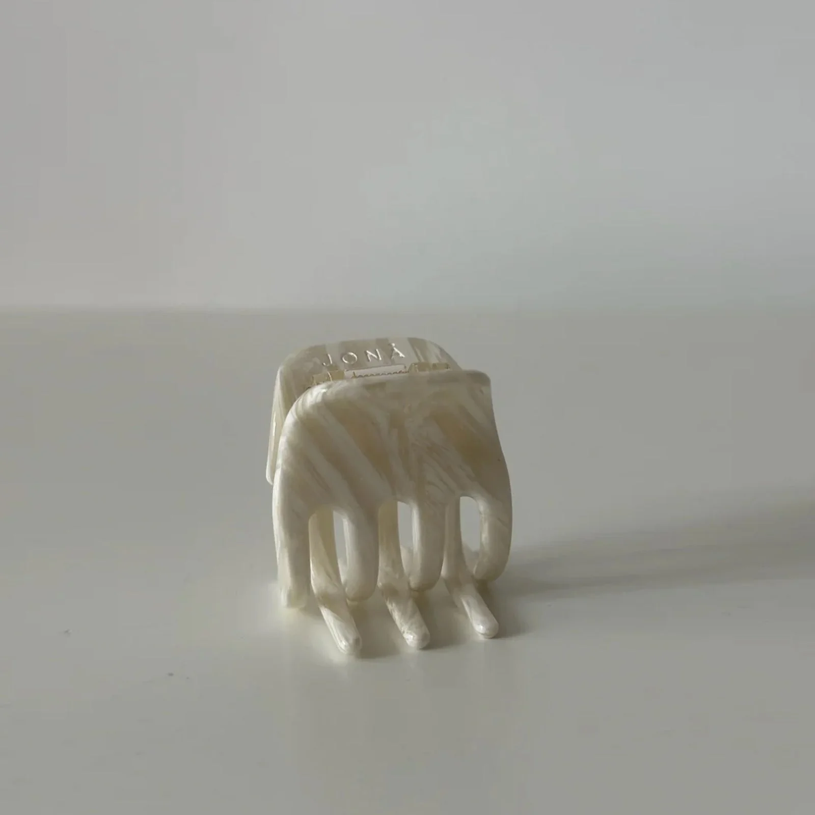 Emma Clip beige swirl